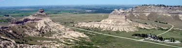 View of Mitchell Pass and the Visitor Center from the summit of Crown Rock. Photo by Jonathan S. Garcia.