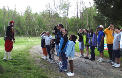 Ranger dressed as a zouave soldier drills middle school children.