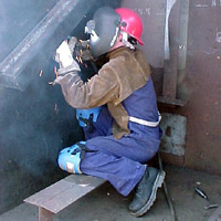 Fig 5. Welder with protective clothing