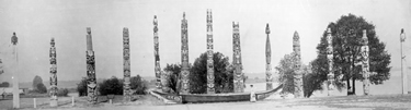 A historic photo of the totems in the park's collection