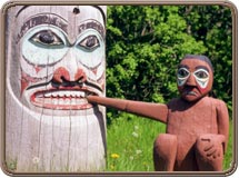  Close-up of Totem Pole and a figure, Ketchikan, Alaska, USA