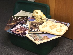 wolf education trunk showing books and other materials