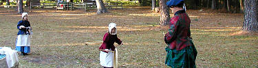 colonial girls playing with hoops