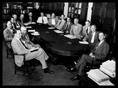 Library of Congress staff gathered around a table