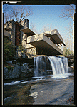 exterior view of a modern house with a waterfall