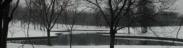 Grounds of the Gateway Arch in winter with snow