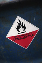 Photo of combustible materials placard on drum.
