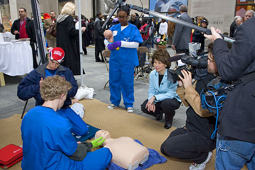 Former-U.S. Secretary of Labor Elaine L. Chao discusses first aid and cardiopulmonary resuscitation with students from SkillsUSA.
