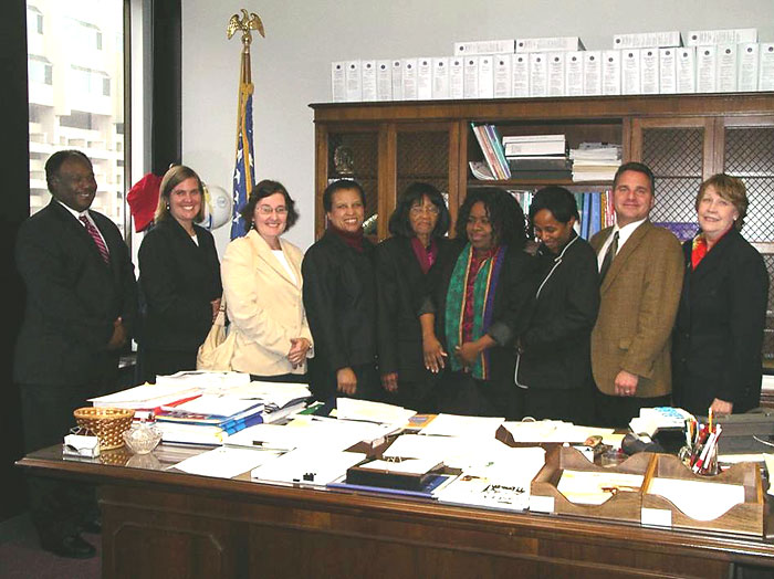 (left to right) Antoine Foureau; Mary Hoye, Providence Area Director; Brenda Gordon, Boston South Area Director; Suzy Magloire; Cecile Dorsinville; Dr. Mona Dorsinville Phanor, President, IMC-SEP; Rachel Vieux; Robert Prezioso,Commissioner Massachusettes Division of Occupational Safety; and Marthe B. Kent, Region 1 Regional Administrator after the Alliance signing