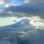 Clouds surround peaks