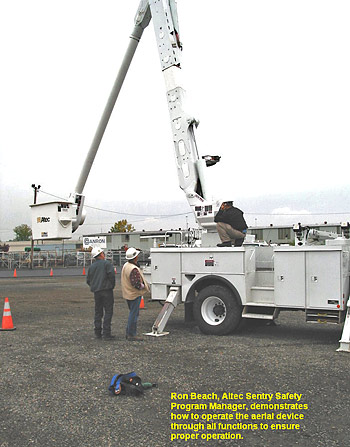 Ron Beach, Altec Sentry Safety Program Manager, demonstrates how to operate the aerial device through all functions to ensure proper operation.