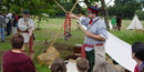 A park Guide presents a program at the Brigade Encampment special event