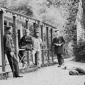 Capt. William Delacombe (far left) and others at bachelor officers' quarters at English Camp.