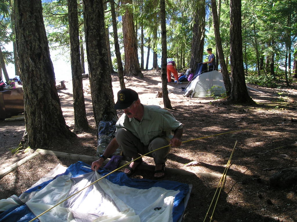 Campers setting up backcountry camp on Ross Lake
