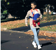 woman walking with baby