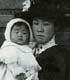 Historic photo of Asian woman with baby