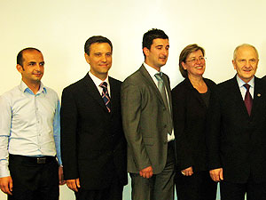 (From left) USAID-supported students Arben Avdiu, Adrian Alo, Visar Peci, and First Lady and President Sejdiu.