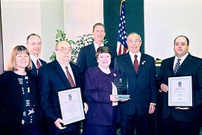 The recipients of the ACHP awards hold their framed certificates and crystal award.