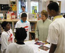 Anne-Imelda Radice,IMLS Director, with students from the Stuart-Hobson Middle School.
