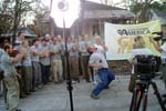 AmeriCorps members applaud an exultant teammate, who just announced to the “Good Morning America” cameras that he and his colleagues had successfully cleared debris from a street in Pass Christian, Miss.