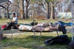 AmeriCorps members take a much-deserved break at their home base in a former city park after working all day to assist the residents of Pass Christian, Miss.