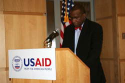 Alonzo Fulgham, USAID Acting Administrator, addresses the group during the International Women's Day event. - Click for access to print-quality photo