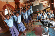 Children during an interactive radio instruction lesson at a government school in Banjarapalya, Karnataka., India (Credit: Anita Khemka)