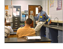 Dr. Milton English in a classroom