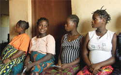 Photo of pregnant women waiting to see the nurse at a health center in Sierra Leone.