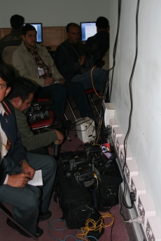 Journalists plug their equipment into the CA's internal broadcast system to receive live feeds of proceedings.