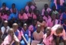 Patira Primary 7 students pose at the school's inauguration ceremony.