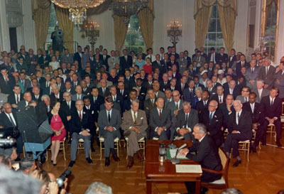 President Lyndon B. Johnson signs the Civil Rights Act of 1964 - July 2, 1964