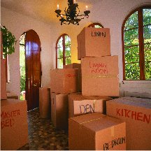 moving boxes sitting inside of a empty home