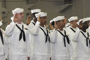 At the U.S.S. George Washington Naturalization ceremony a group of U.S. Navy Sailors took the Oath of Allegiance.
