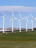 A row of wind turbines producing renewable energy.