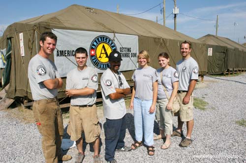 Pass Christian, MS - AmeriCorps members currently deployed to Pass Christian, MS pause for a group photo.  From August 28 to 30, 2006, Eight members of the President’s Council on Service and Civic Participation will tour recovering areas of the Gulf Coast along with seven members of the Board of Directors of the Corporation for National and Community Service. The group participated in events commemorating the first anniversary of Hurricane Katrina, visited hurricane recovery operations, and thanked volunteers for their extraordinary contributions during the first year of relief efforts.