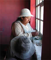 jphoto - Bolivian lady making loan payment