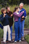 A family touring a local wetland.