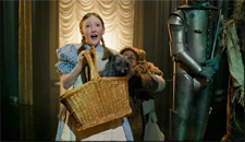 Wizard of Oz: Dorothy holding Toto in a basket