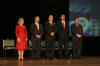 From left to right: Nan Nelson, USCIS Miami District Office Acting Director Donald Monica, USCIS Director Emilio T. González, Florida Sen. Mel Martínez, and Chief of the USCIS Office of Citizenship Alfonso Aguilar attend the naturalization ceremony in Orlando, FL, Feb. 13, 2006
