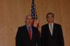 USCIS Director Emilio T. González and Commerce Secretary Carlos M. Gutierrez at the “Outstanding American by Choice” recognition event in Philadelphia, PA, May 15, 2006
