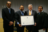 From left to right: Detroit District Director Mick Dedvukaj, "Outstanding American by Choice" recipient Subir Chowdhury, USCIS Acting Deputy Director Michael Aytes, and Chief Judge Gerald E. Rosen in Detroit, MI, Apr. 29, 2009