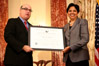 USCIS Director Emilio T. González presents Indra K. Nooyi with the “Outstanding American by Choice” recognition in Washington, DC, Apr. 23, 2007