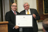 USCIS Director Emilio T. González presents Dr. Peter W. Schramm with the “Outstanding American by Choice” recognition in Washington, DC, Jun. 29, 2007