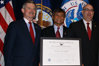 From left to right: Department of Veterans Affairs Secretary Jim Nicholson, "Outstanding American by Choice" recipient Major General Antonio M. Taguba (ret.), and USCIS Director Emilio T. González in Washington, DC, Jul. 24, 2007