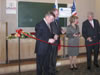 US Consul General Mary Kruger (center) congratulated the Russian and American colleagues on their collaboration in opening the AETC (from left: Nikolay Belyayev, Rector of the Medical Academy for Postgraduate Studies; Vladimir Zholobov, First Deputy of the St. Petersburg Health Committee; Mary Kruger, US Consul General; Jim Smith, Executive Director of the AIHA)