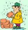 Image of a man putting down sand bags