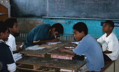 Seventh graders at Pombrut Primary School have a serious discussion during science class.