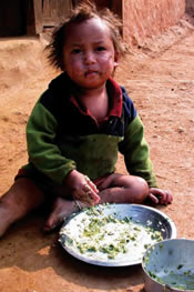 Photo of a child eating. Source: Mike Jay Browne