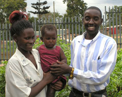 Photo of a mother, father and baby in Uganda.